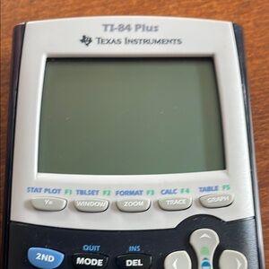 Texas Instruments TI-84 Plus Black and Gray Calculator